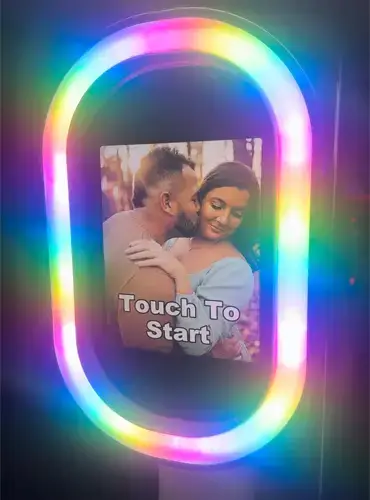 Bride and groom on screen using digital photo booth at a Pittsburgh wedding