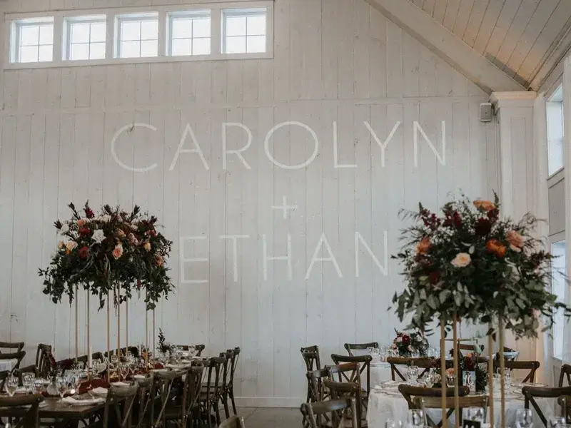 Custom wedding monogram projected on the dance floor at The Grayson House wedding venue in Uniontown, Pennsylvania by Soundwaves Event Group