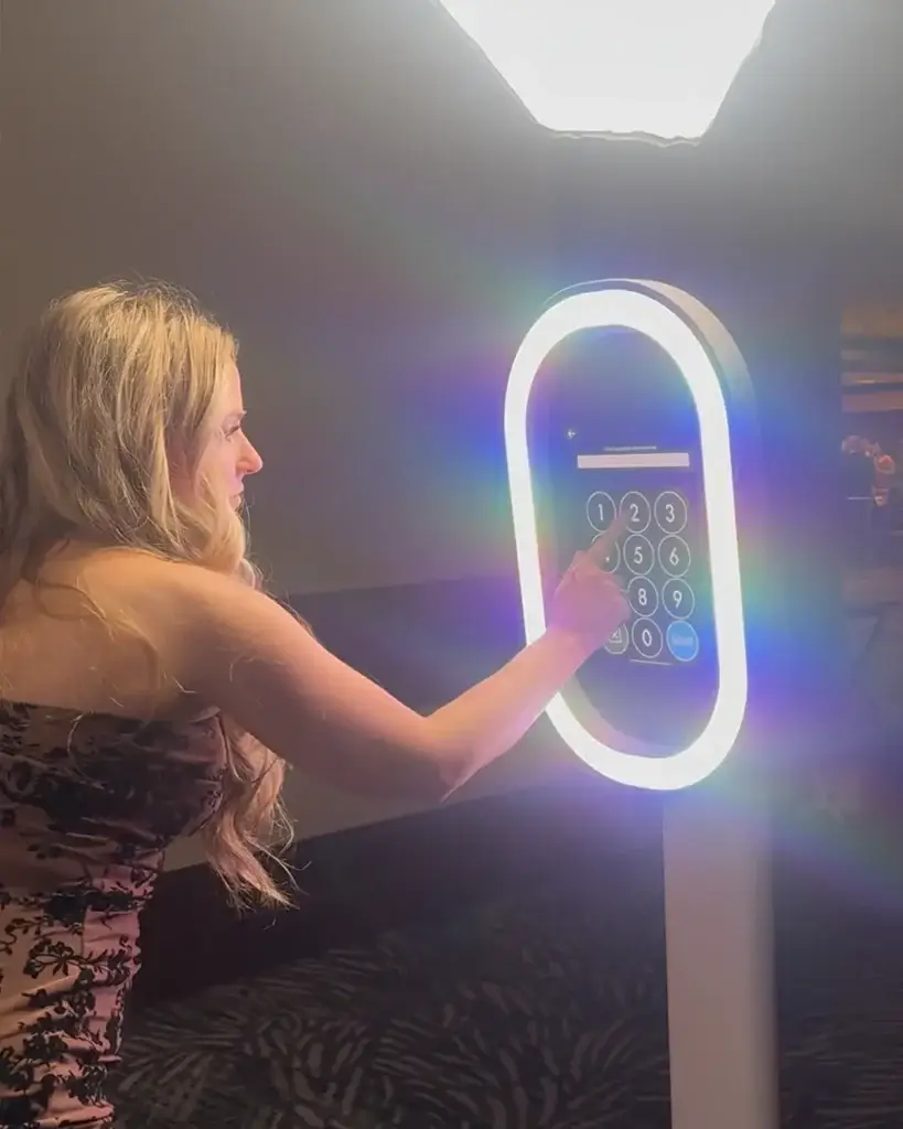 Wedding guest entering her phone number to instantly receive her digital photo booth picture at a Pittsburgh event