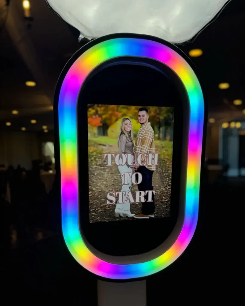Guest starting the digital photo booth by touching the screen at a Pittsburgh event