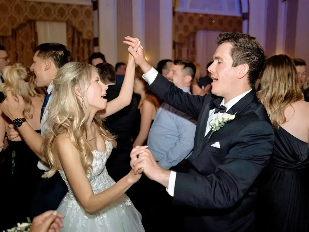 Bride and groom dancing on a packed dance floor at George Washington Hotel in Washington PA