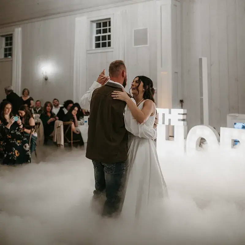 Bride and groom sharing their first dance on a cloud at The Grayson House in Uniontown PA