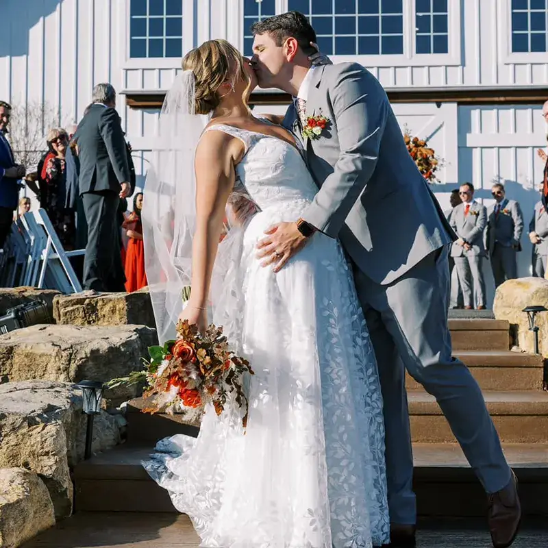 Bride and groom sharing a kiss at The Grayson House in Uniontown PA