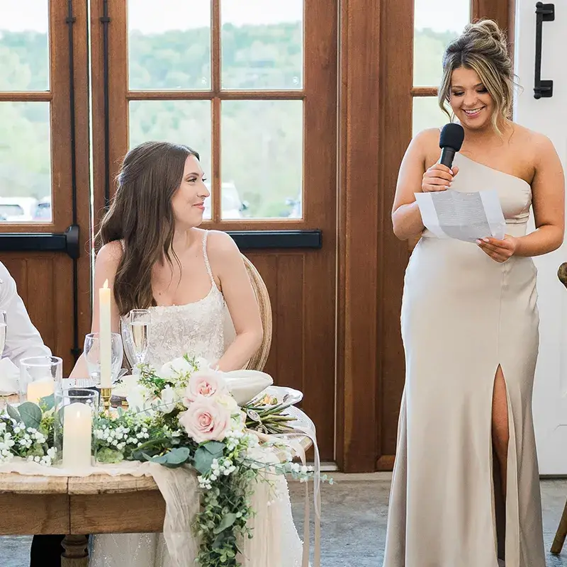 Maid of honor giving a toast at a wedding reception at The Grayson House in Uniontown PA