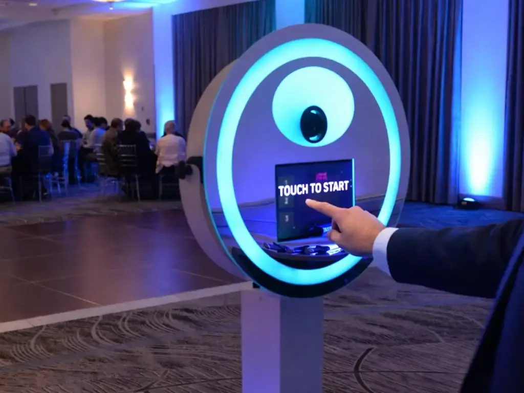 Guest touching screen to start Pittsburgh printing photo booth at event