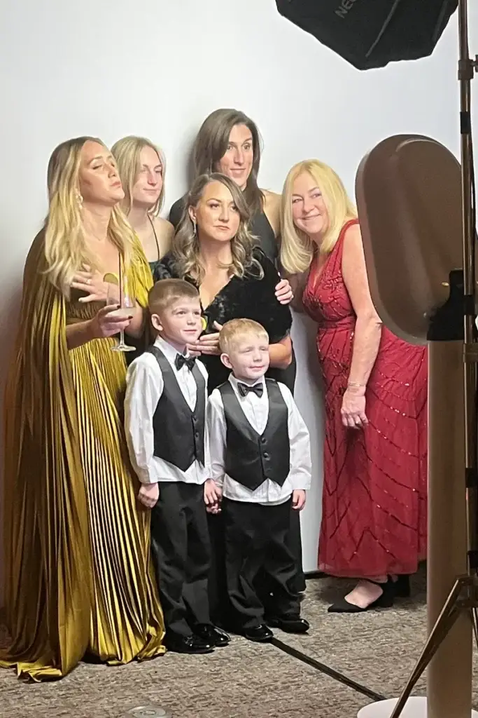 Group of seven guests using the digital photo booth at a Pittsburgh wedding reception