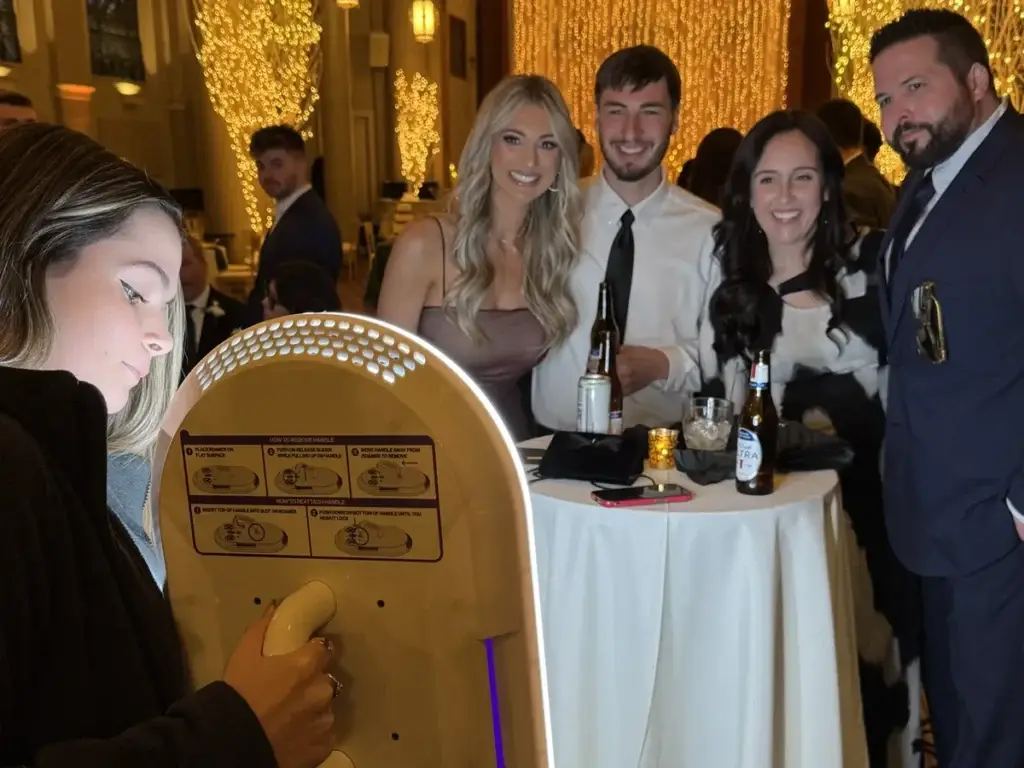 Tara using roaming Photo Booth with wedding guest at Grand Hall at The Priory Pittsburgh