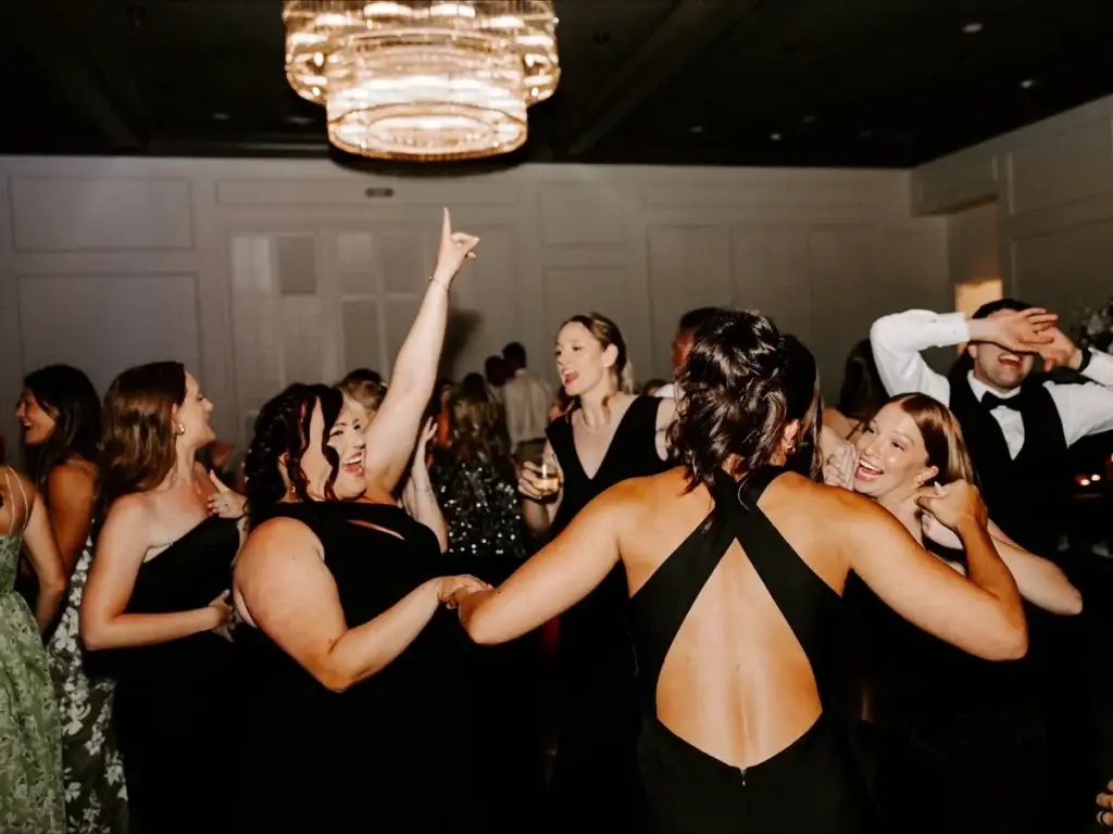 Bridesmaids dancing together on a packed dance floor at The Audrey wedding reception in Canonsburg PA