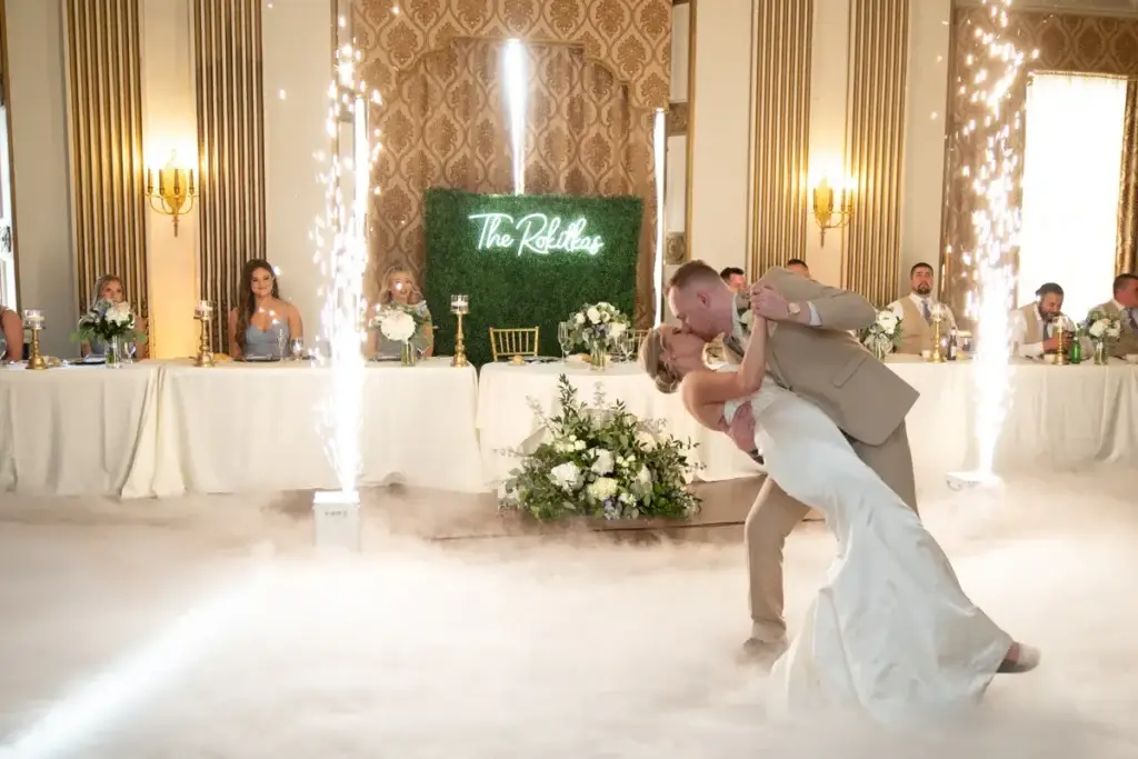 Bride and groom first dance on the clouds with indoor sparklers at George Washington Hotel in Washington PA