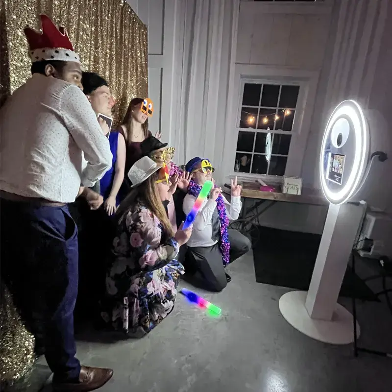 Wedding guests using Soundwaves Event Group’s printing Photo Booth at The Grayson House in Uniontown PA
