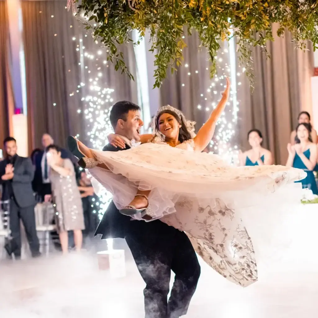 Bride and groom first dance with magic sparkler effects at a Wyndham Grand Pittsburgh wedding reception