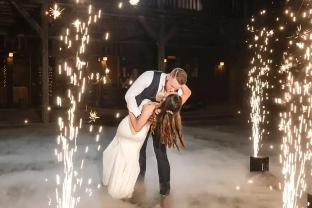 Bride and groom first dance outside at an Armstrong Farms wedding in Butler, PA with dancing on the clouds and cold sparkler effects by Soundwaves Event Group