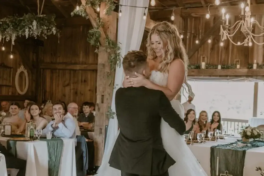Bride and groom first dance at a wedding reception at Pinehall at Eisler Farms in Butler, PA with romantic lighting and professional DJ by Soundwaves Event Group