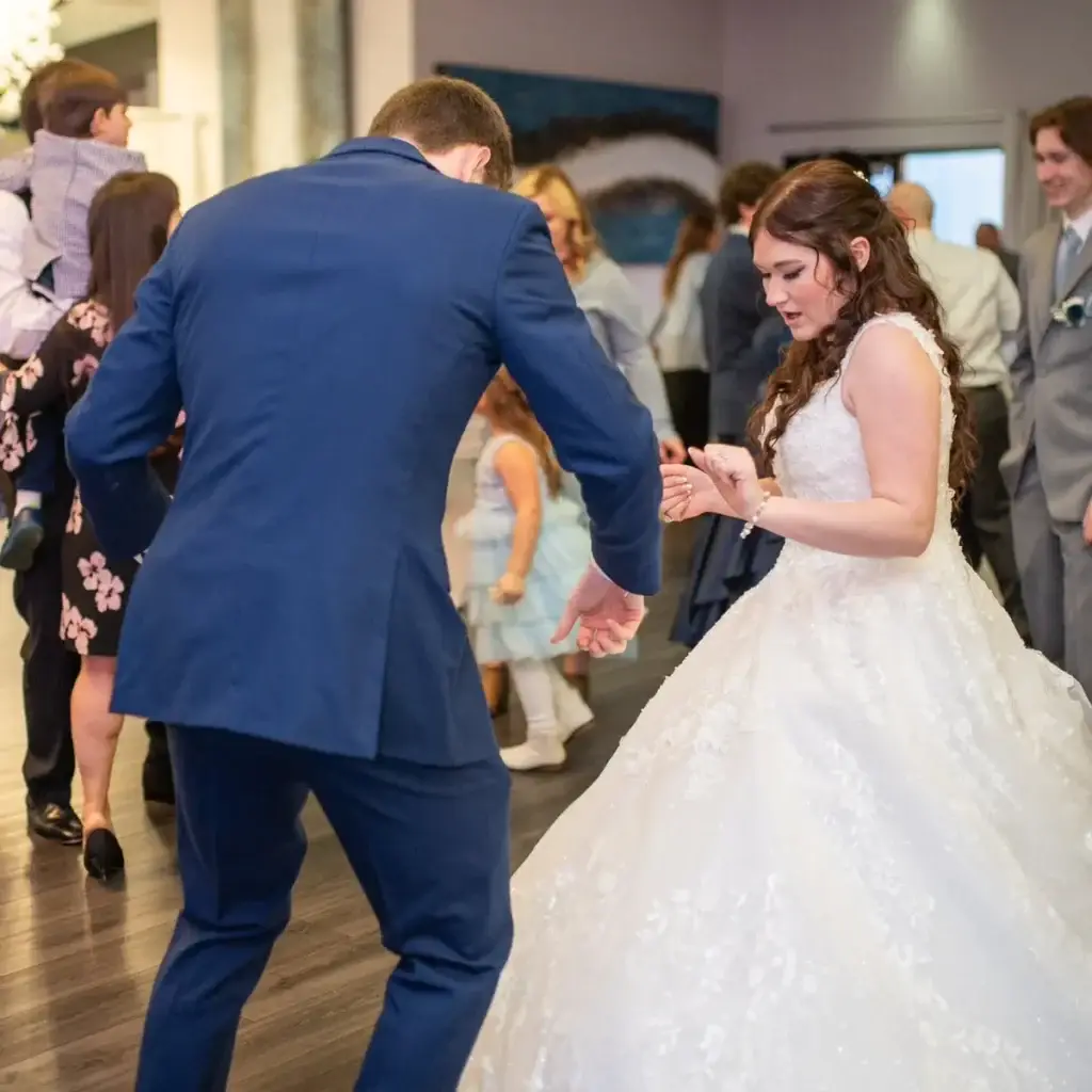 Bride and groom dancing on a packed dance floor at Sunset Room at The Vista wedding in Elizabeth PA